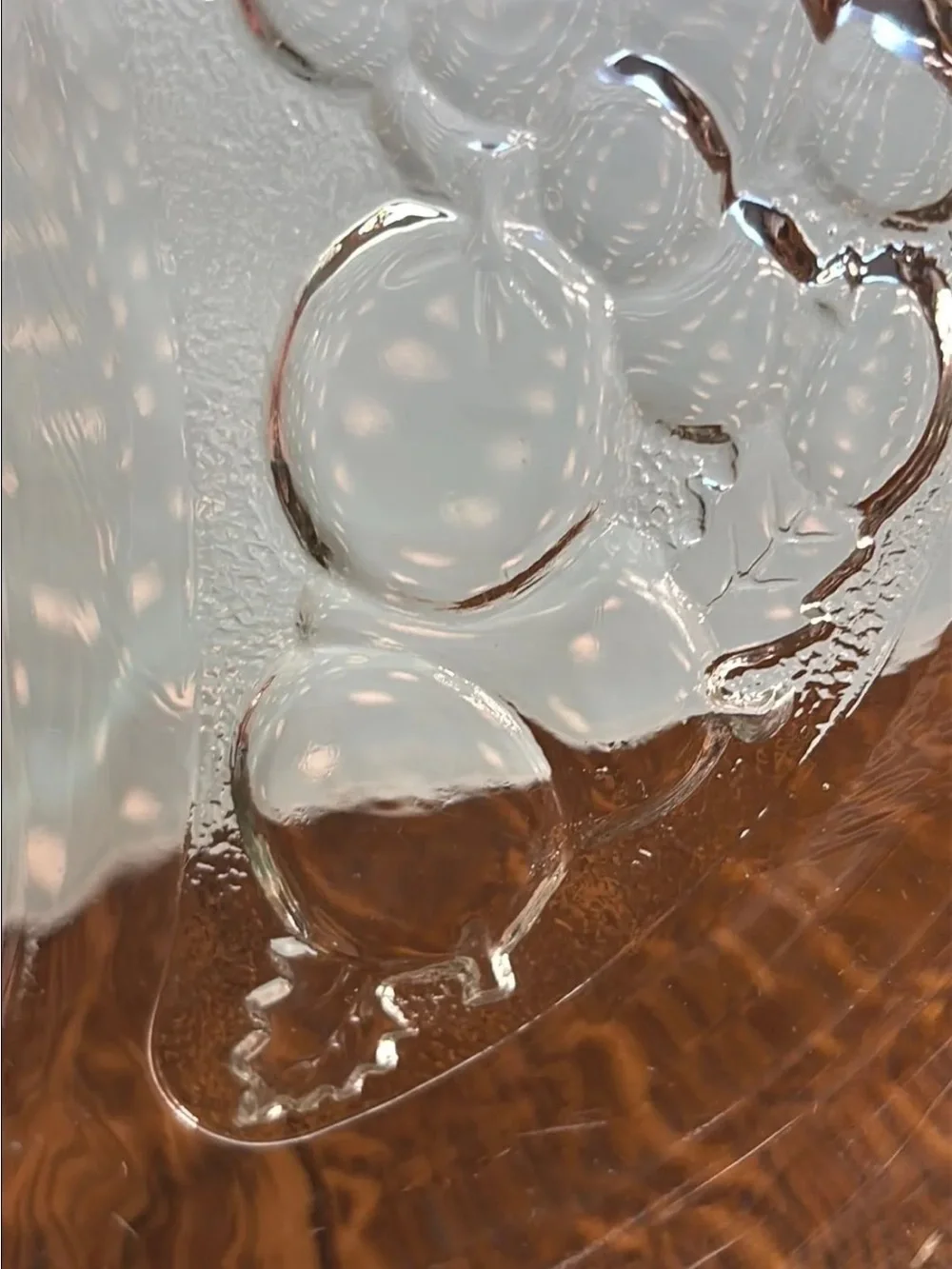 Vintage clear crescent shaped glass side or bone dishe with fruit design